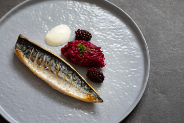 Grilled mackerel with beetroot and pickled blackberies