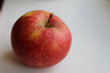 fruit red Apple close up on a white background with a place to insert text