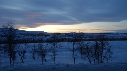 landscape in Sweden in winter during sunset