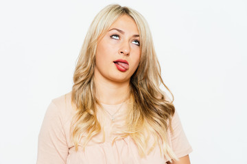 Naklejka premium Woman showing tongue