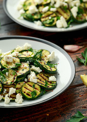 Warm salad with grilled zucchini, garlic and herbs