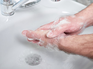 Fototapeta premium Wash hands with soap. Coronavirus protect. COVID-2019 prevention