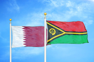 Qatar and Vanuatu two flags on flagpoles and blue cloudy sky