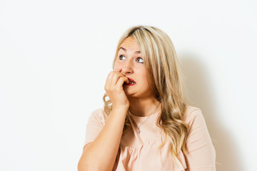 Woman bites his nails