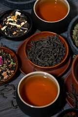 Obraz na płótnie Canvas tea tasting different varieties, vertical closeup