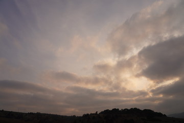 Background of colorful sky concept, Dramatic sunset with twilight color sky and clouds.
