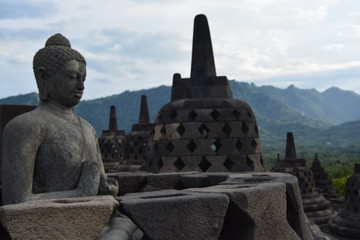 statue on the top of borobudur temple