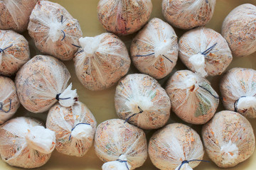 Easter egg coloring. Stage of preparation of decor for Easter, work environment. Bio and natural way of painted eggs with fresh leaves and onion shells. Easter concept.