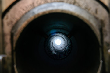 View through the barrel of a 105mm Light Field Gun Howitzer showing spiral rifling which spins the...