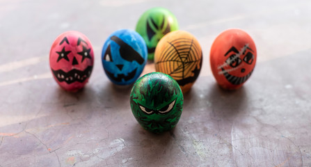 Eggshells painted as face animation to represent Corona virus. Animation art and object photography.