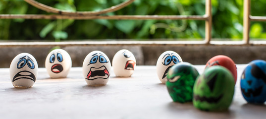 Eggshells painted as face animation to represent Corona virus and the victims. Animation art and...