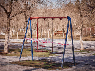 Fototapeta premium children's swing quarantined