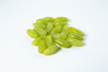 green grape lies on a white background