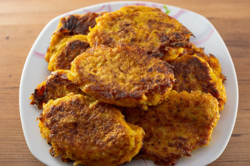 Potato pumpkin burgers, pancakes. Studio Photo cooking