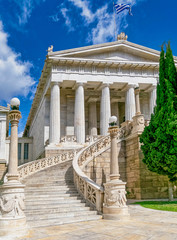 Athens Greece, the natiomal library classical building impressive marble stairway under blue sky with some clouds