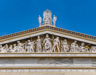 ancient Greek gods and deities statues in Neo classical pediment of the national academy of Athens...