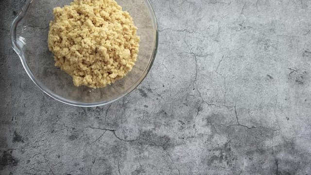 stop motion video the process of preparing the national Jewish dish falafel from fresh chickpeas, with the addition of parsley, dill, turmeric, onion, garlic and spices paprika, salt, pepper. Served