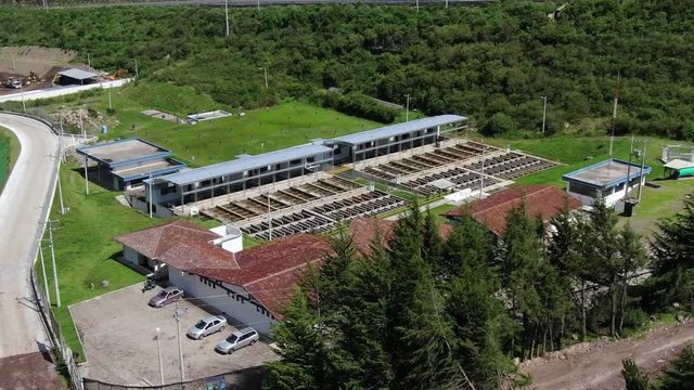 Aerial top view recirculation solid contact clarifier sedimentation tank, Water treatment plant Papallacta