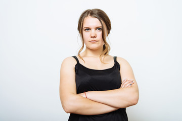 Portrait of a woman arms folded