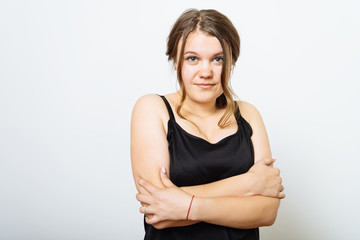 Fototapeta premium Portrait of a woman arms folded