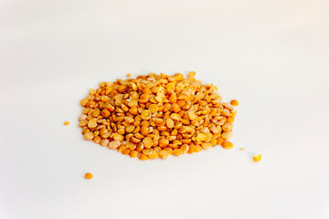 Yellow split peas isolated on a white background. Useful legumes for cooking soups and porridges.