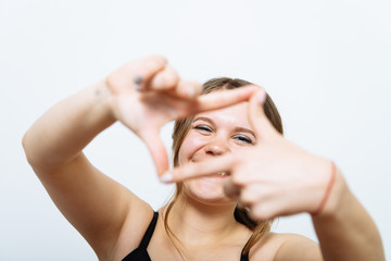Fototapeta premium woman making a hand frame