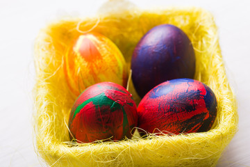 Holidays, traditions and Easter concept - Multi-colored decorative colourful eggs.