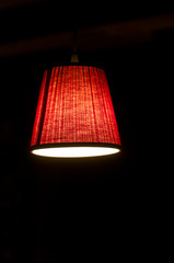 closeup of red lampshade in dreamy atmosphere
