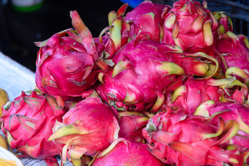 Dragon fruit for sale at a market stall