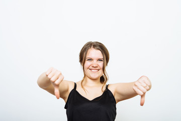 Woman showing a thumb down gesture