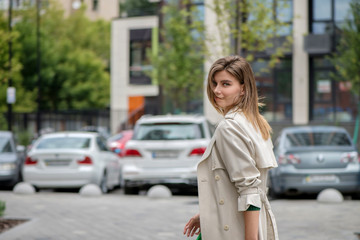 smiling girl walking in the street city 