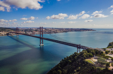 Fototapeta na wymiar 24 April bridge in Lisbon in Portugal, aerial drone view