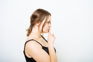 Fototapeta premium woman put finger on her lips