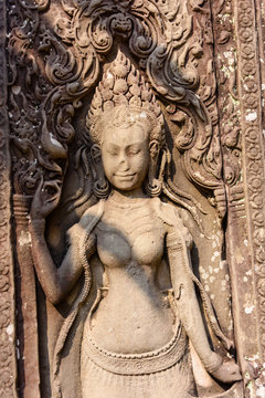 Female figure carved into a wall at the Unesco World Heritage site of Ankor Thom, Siem Reap, Cambodia