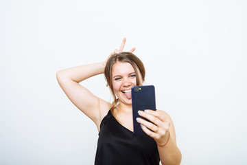 Naklejka premium Woman taking selfie