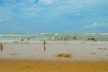 People relaxing and sun bathing in beautiful and pristine Cape Vidal beach in St Lucia under Isimangaliso wetland park South Africa