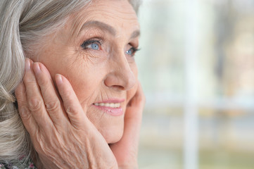 Close up portrait of beautiful senior woman