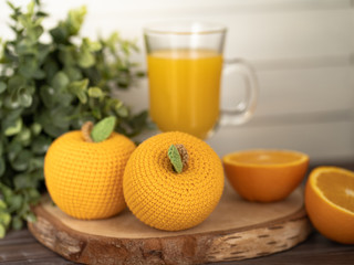 Knitted fruits. Concept. Stylization. Needlework. Environmentally friendly toys for children to develop fine motor skills. Hand made toys. 