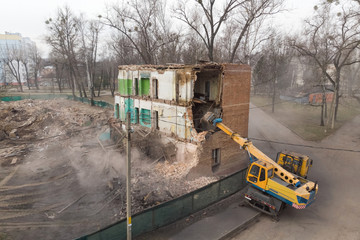 Destruction of a non-residential brick apartment building