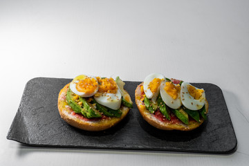 Bread with tomato, avocado and egg