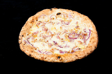 italian pizza cheese and onions in a black background