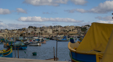 the colorful boats of Marsaxlokk harbor