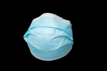 Obraz premium isolierte MNS-Maske, Mundschutz mit schwarzem Hintergrund