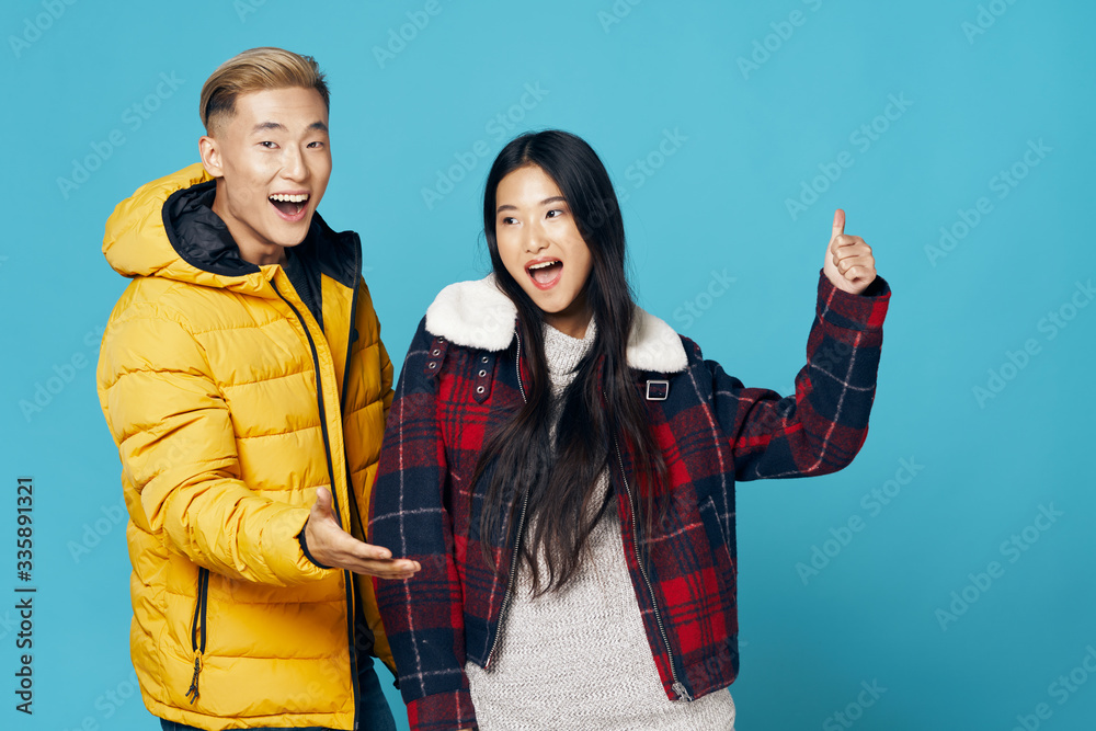 Wall mural young couple in winter