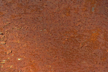 Rusty metal sheet.  background for design. abstract texture of rusty color.textural pattern for décor. metal corrosion idea background