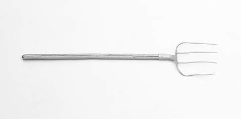 old white pitchfork isolated on white background