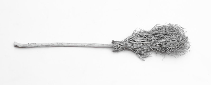 witch white broom isolated on white background