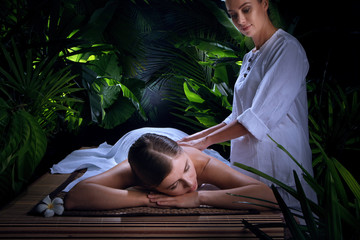  portrait of young beautiful woman in spa environment - 335895746