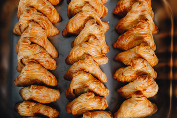 Set of coffee break in the hotel during conference meeting, with tea and coffee catering, decorated catering banquet table with variety of different pastry and bakery, with croissants and cookies