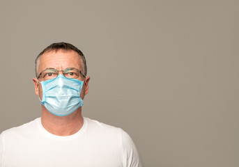 man wearing a protective mask isolated on white background.